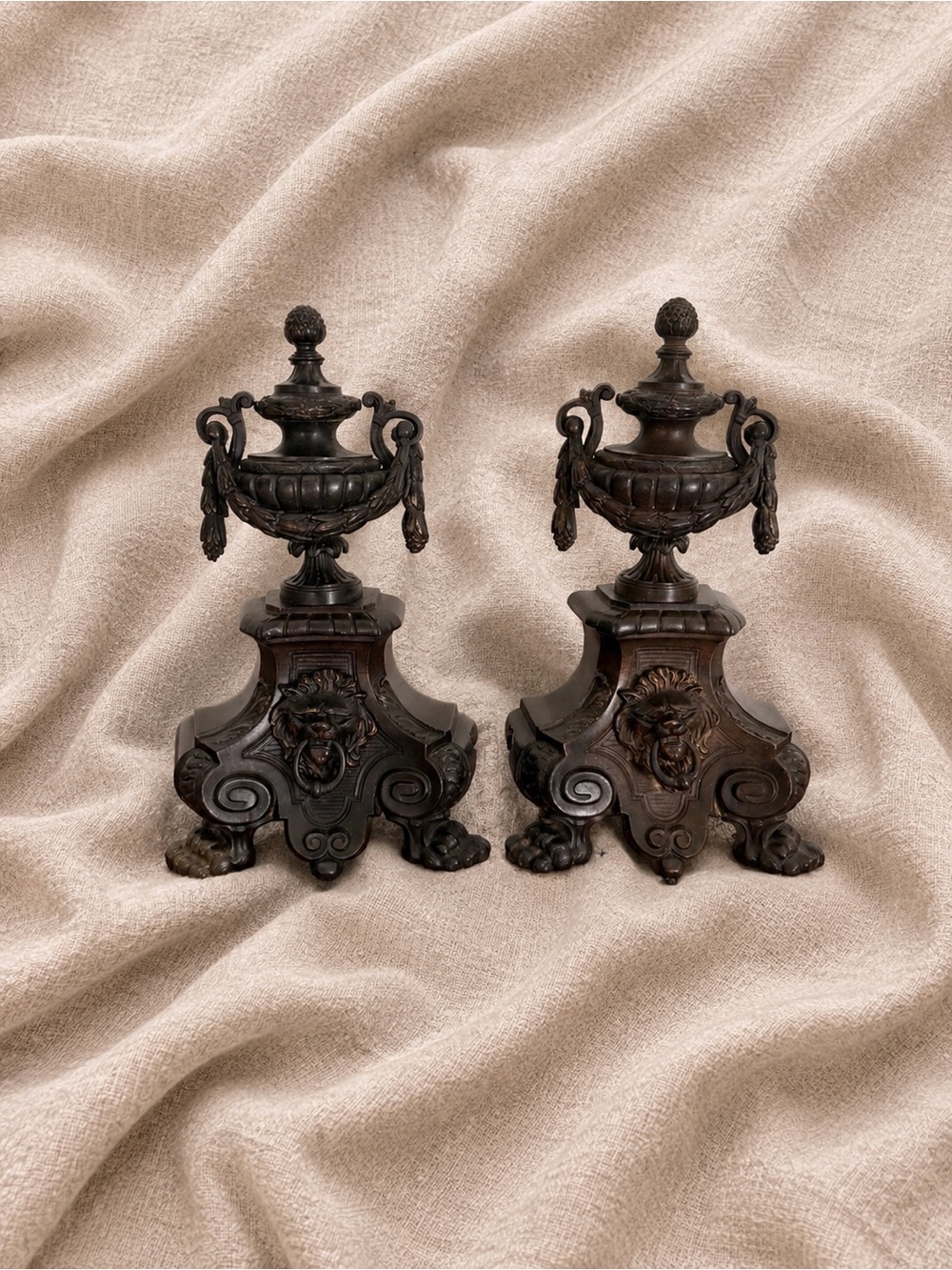 Pair of Antique French Bronze Louie XVI Style Chenet Heads with Lion Masks